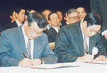 Labor and Management Resolutions for the 21st Century signed in January 1996