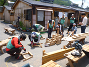 Making benches for temporary housing areas